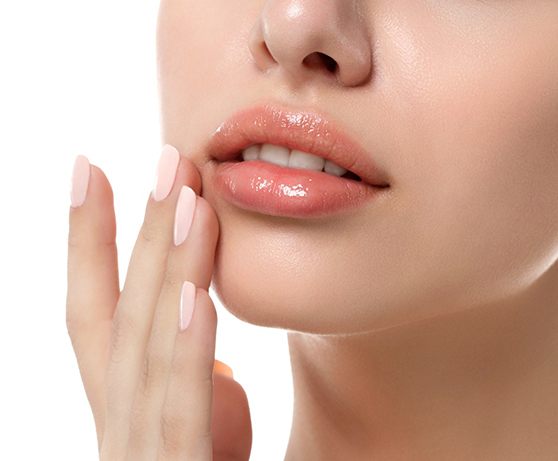 Woman showing off smooth skin after Botox Cosmetic